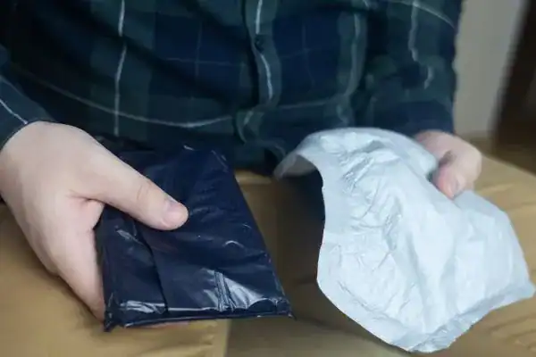 image of man holding stool incontinence Nottingham products